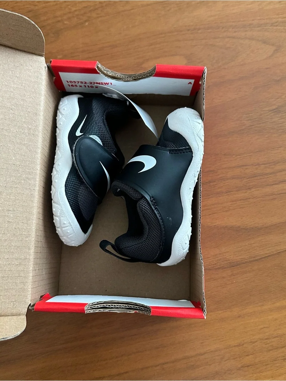Nike Kids Black and White Slip-On Sneakers